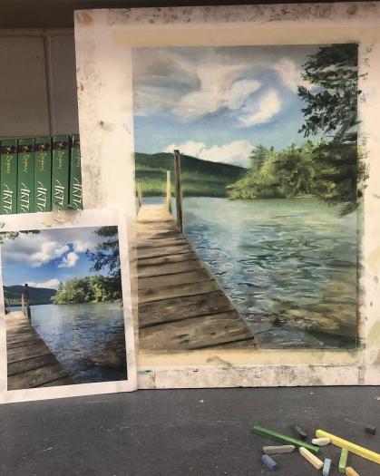 A painting of a wooden dock extending into a calm lake, with green hills and trees in the background under a partly cloudy blue sky. 